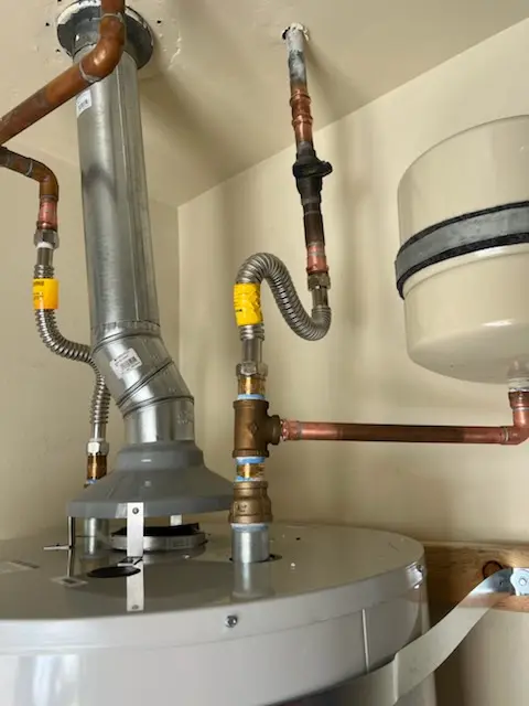 Water heater installation and plumbing repair in Coachlight Village